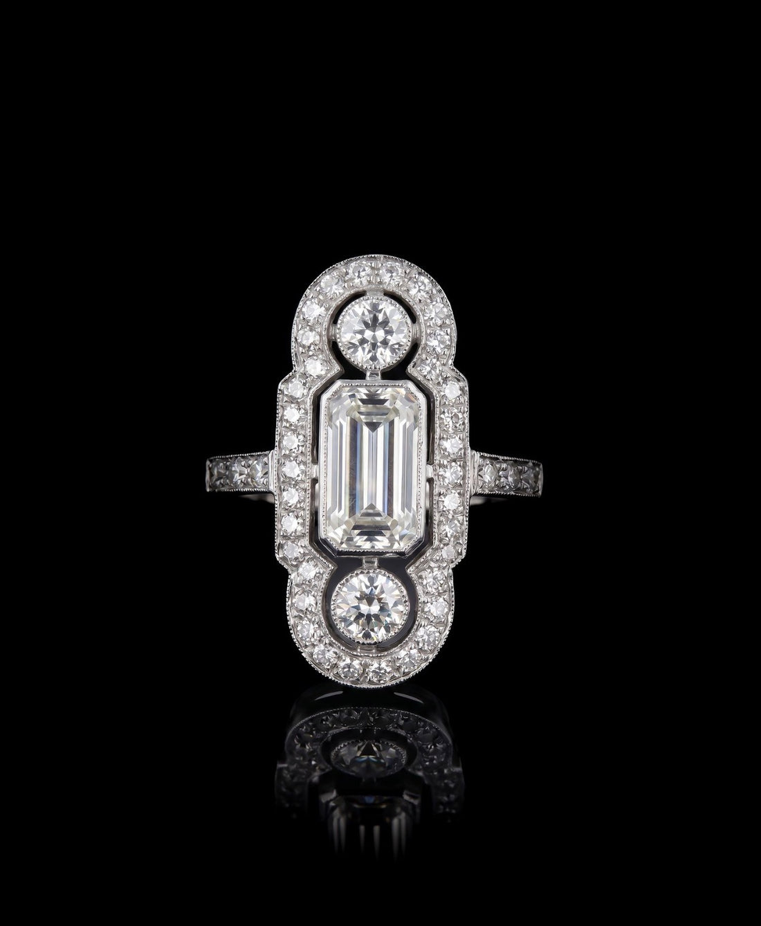 One of a Kind Elongated Emerald Cut 1.03 VVS2, .50 Round VVS2
