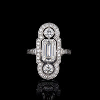 One of a Kind Elongated Emerald Cut 1.03 VVS2, .50 Round VVS2