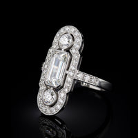 One of a Kind Elongated Emerald Cut 1.03 VVS2, .50 Round VVS2
