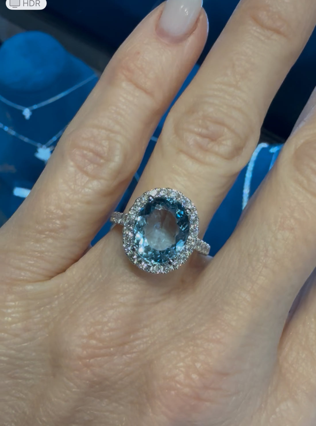 Aquamarine, oval 3.65 Ct, .67 Ct. Diamonds, set in 18k WG