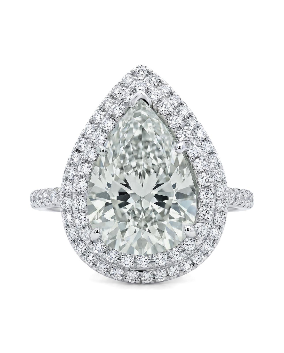 7.03 Ct Pear Diamond, Natural, K SI2 set with 1.18Ct Dia, 18k Gold