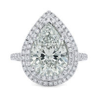 7.03 Ct Pear Diamond, Natural, K SI2 set with 1.18Ct Dia, 18k Gold