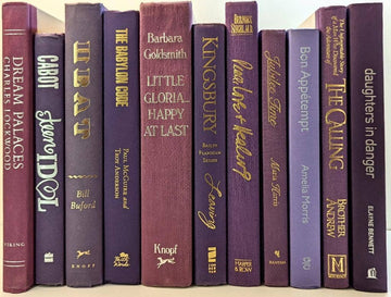 Purple books by the foot for decor